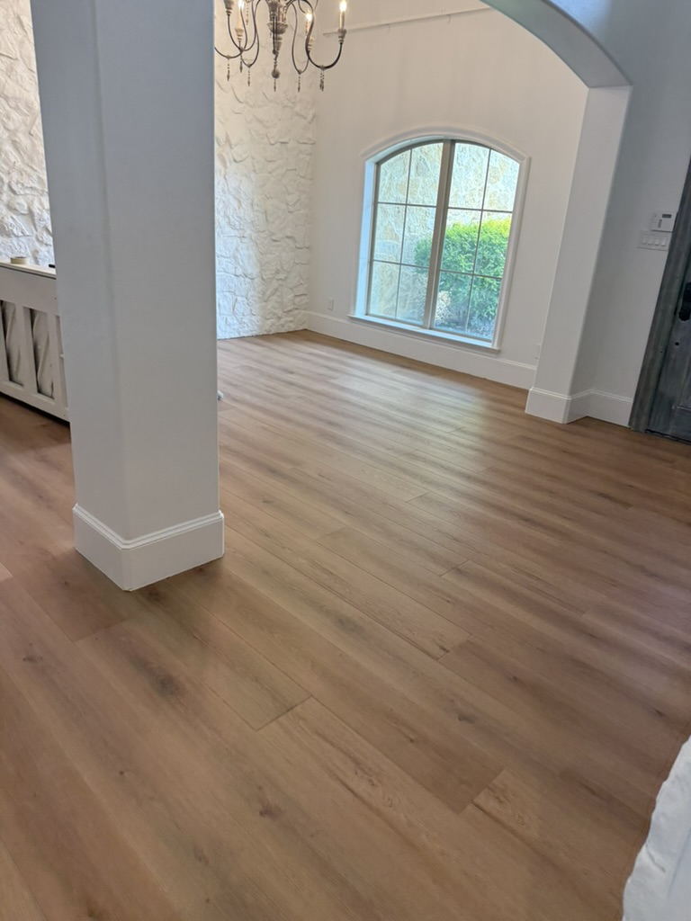 Kitchen and dining area remodeling project by Apex Point Services with updated flooring