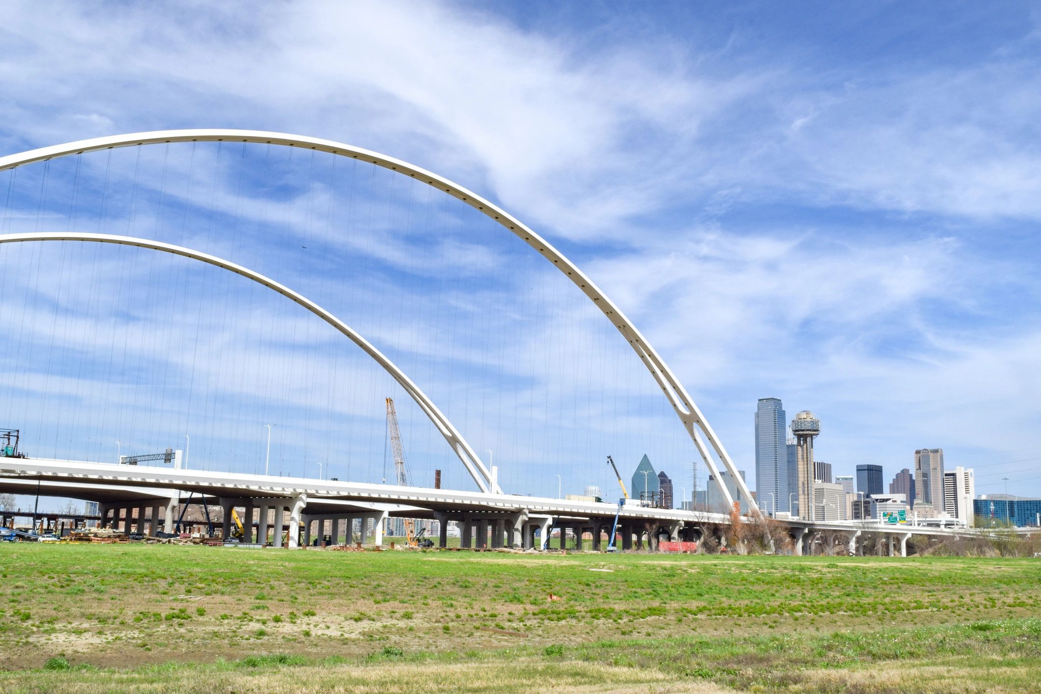 Downtown Dallas skyline and Margaret Hunt Hill Bridge representing Apex Point Services general contracting, roofing, and remodeling services in Dallas, Texas