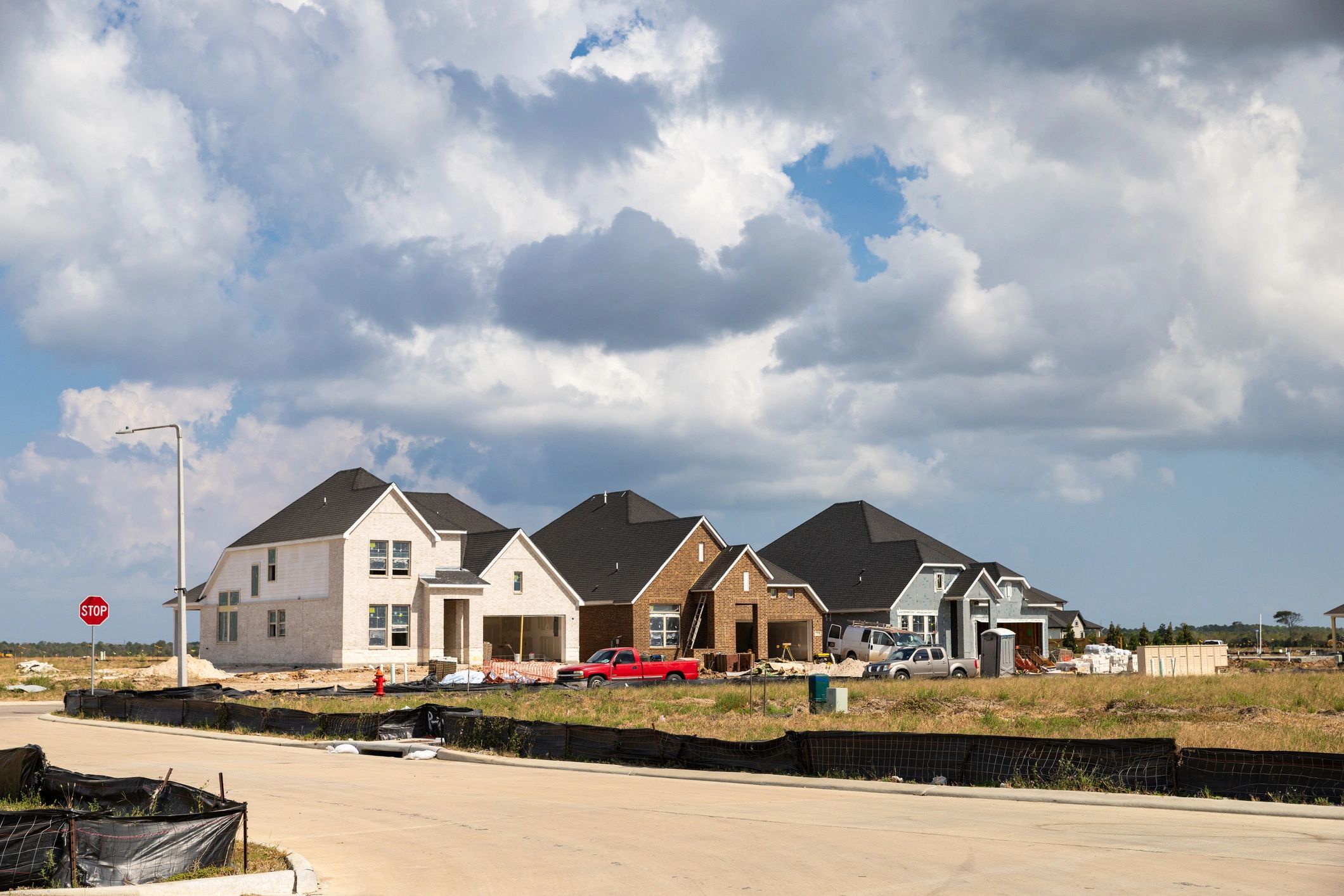 Texas homes under construction and roofing work