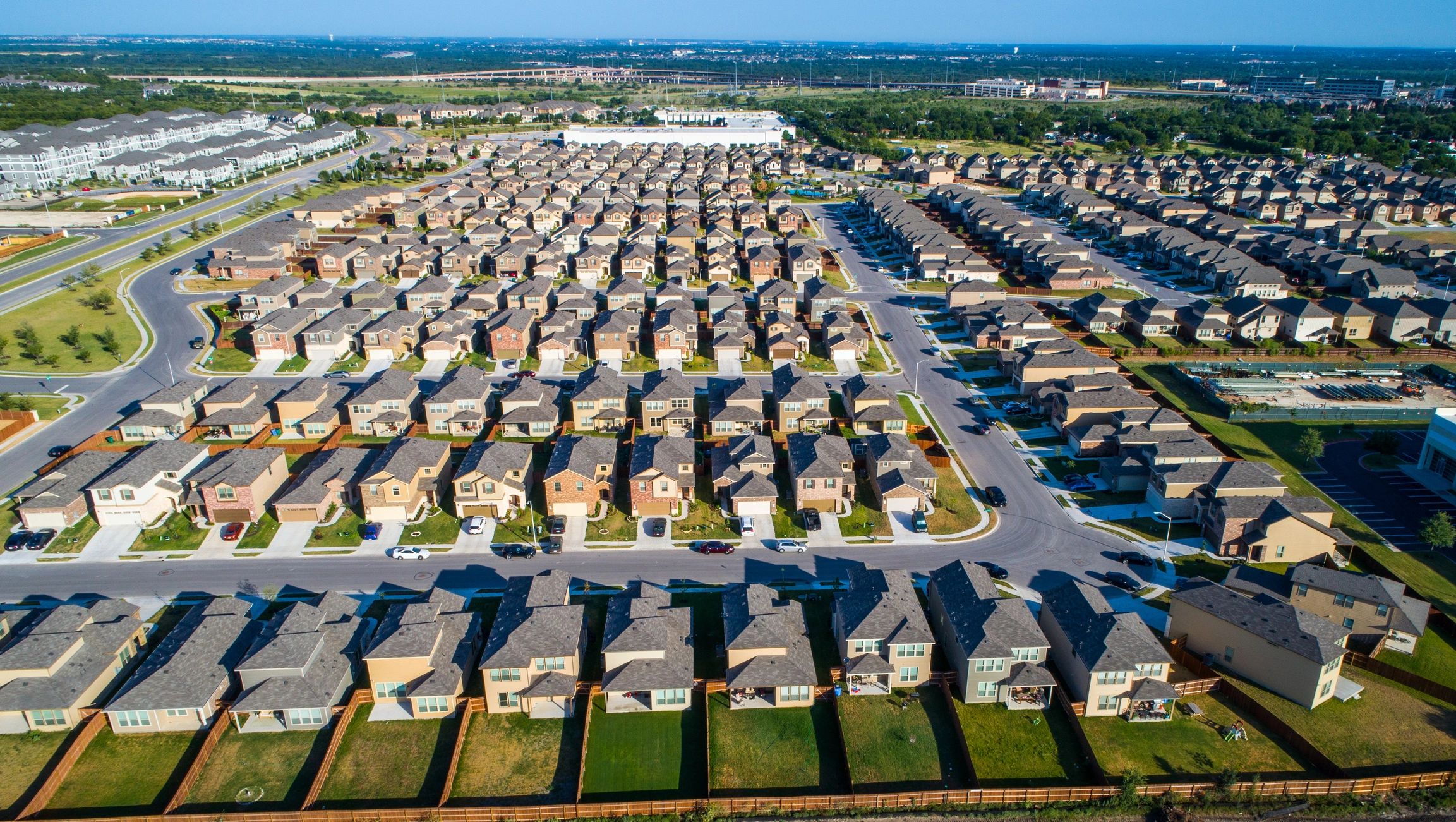 Wide shot of suburb neighborhood new development near Round Rock TX