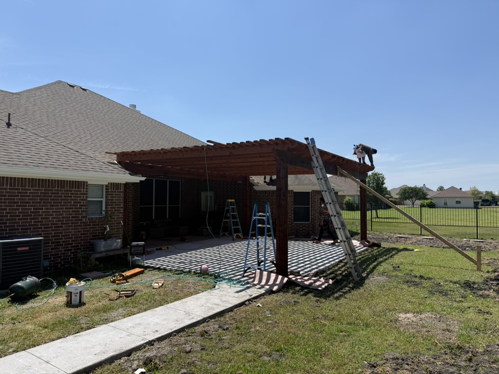 Overhead exterior framing and roofline detail from an Apex Point Services project