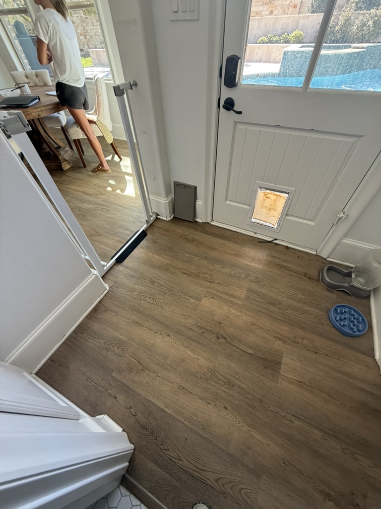 Back door mudroom area with completed LVP flooring, Rowlett TX