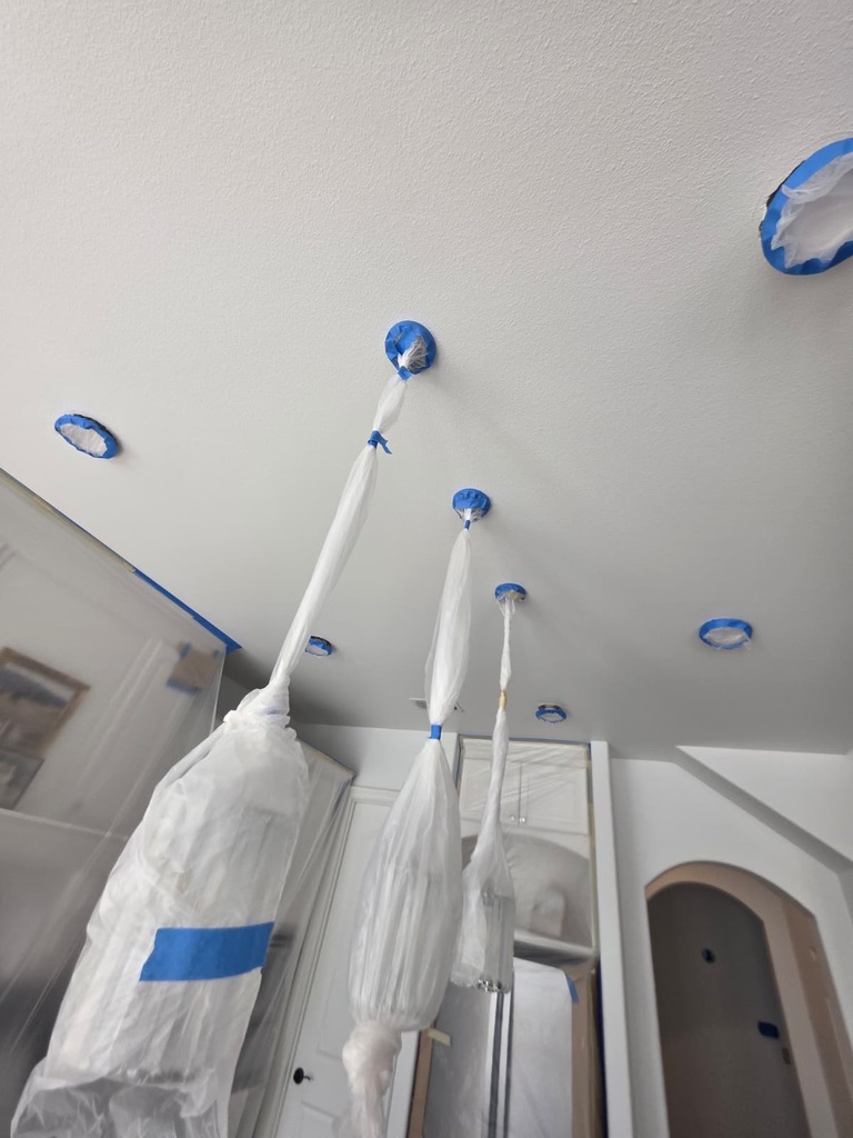 Ceiling recessed lights masked before painting, Rowlett TX interior restoration