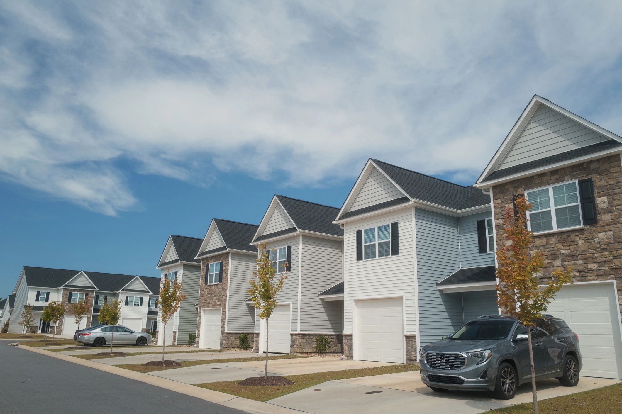 Wide residential driveway and front exterior